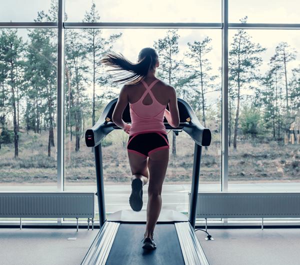 Woman running on Walkslim treadmill